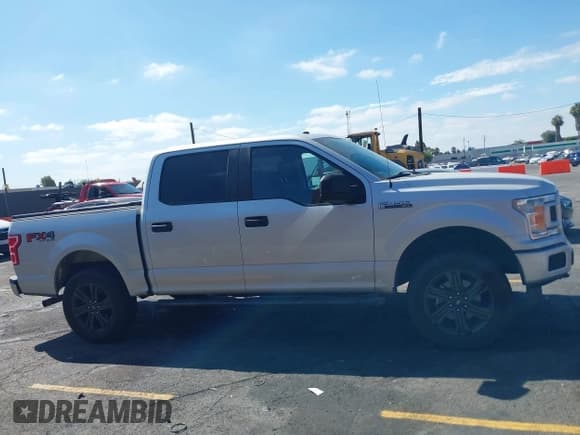 ✅ 2018 Ford F-150 XL • VIN: 1FTEW1E55JKD34898 • Lot: 42842636. Listed on IAAI with 85,969 mi. Free auction sales archive from the USA and detailed vehicle history report at DreamBid. Image 13.
