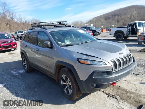 ✅ 2016 Jeep Cherokee Trailhawk • VIN: 1C4PJMBB6GW335837 • Lot: 41547478. Listed on IAAI with 236,483 mi. Free auction sales archive from the USA and detailed vehicle history report at DreamBid. Image 1.