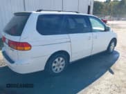 ✅ 2003 Honda Odyssey EX-L • VIN: 5FNRL180X3B071415 • Лот: 43482389. Опубликован ранее на IAAI с пробегом 293 592 миль. Бесплатный доступ к архиву аукционных продаж из США и подробный отчёт об истории автомобиля на DreamBid. Изображение 4.