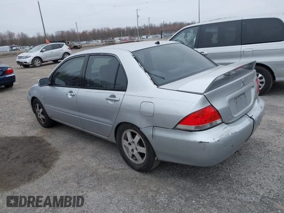 ✅ 2004 Mitsubishi Lancer LS • VIN: JA3AJ36E44U020349 • Lot: 41714325. Listed on IAAI with Not provided. Free auction sales archive from the USA and detailed vehicle history report at DreamBid. Image 3.