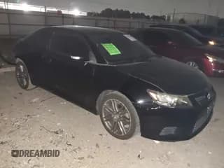 ✅ 2013 Scion tC • VIN: JTKJF5C77D3065143 • Lot: 43107404. Wystawiony na IAAI z przebiegiem 119 263 mil. Bezpłatny archiwum sprzedaży aukcyjnych z USA i szczegółowy raport historii pojazdu na DreamBid. Zdjęcie 1.