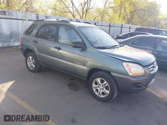 ✅ 2007 Kia Sportage LX • VIN: KNDJE723X77406844 • Лот: 42027451. Опубликован ранее на IAAI с пробегом 187 979 миль. Бесплатный доступ к архиву аукционных продаж из США и подробный отчёт об истории автомобиля на DreamBid. Изображение 1.