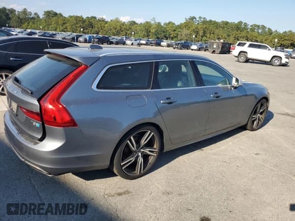 ✅ 2019 Volvo V90 R-Design • VIN: YV1102GM4K1091676 • Лот: 81310285. Опубликован ранее на Copart с пробегом 55 942 миль. Бесплатный доступ к архиву аукционных продаж из США и подробный отчёт об истории автомобиля на DreamBid. Изображение 3.
