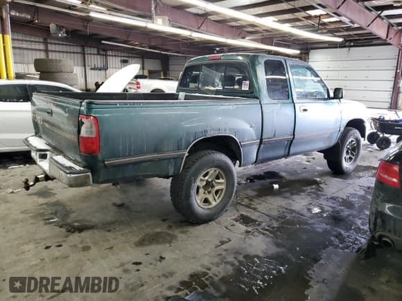 ✅ 1997 Toyota T100 SR5 • VIN: JT4UN24D4V0041363 • Лот: 45896305. Опубликован ранее на Copart с пробегом 338 486 миль. Бесплатный доступ к архиву аукционных продаж из США и подробный отчёт об истории автомобиля на DreamBid. Изображение 3.
