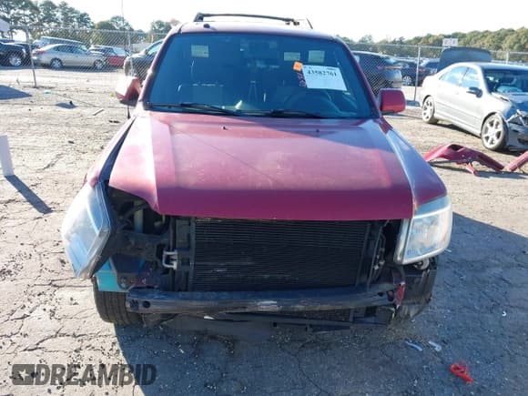 ✅ 2008 Mercury Mariner Premier • VIN: 4M2CU87158KJ37203 • Lot: 43582761. Wystawiony na IAAI z przebiegiem 128 300 mil. Bezpłatny archiwum sprzedaży aukcyjnych z USA i szczegółowy raport historii pojazdu na DreamBid. Zdjęcie 6.