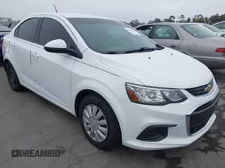 2018 Chevrolet Sonic LS z VIN 1G1JB5SHXJ4113116, wystawiony jako IAAI lot #42450167 z przebiegiem 87 470 mil mil oraz . Historia ofert i sprzedaży dostępna na DreamBid. Obrazek 1.