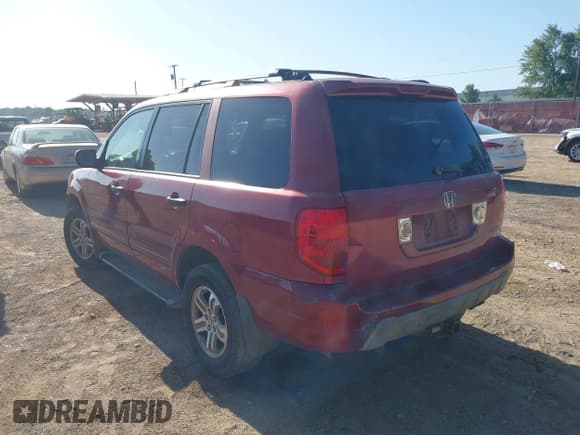 ✅ 2003 Honda Pilot EX • VIN: 2HKYF18523H534406 • Lot: 42867601. Listed on IAAI with 248,238 mi. Free auction sales archive from the USA and detailed vehicle history report at DreamBid. Image 3.