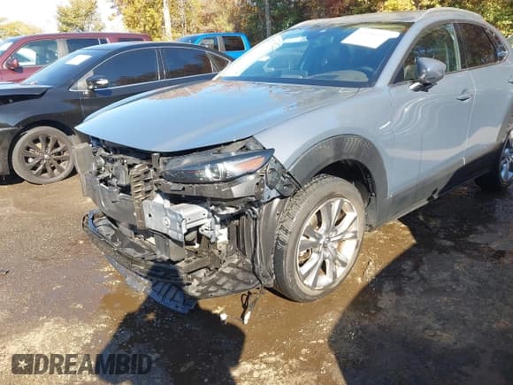 ✅ 2021 Mazda CX-30 Premium • VIN: 3MVDMBDL3MM252803 • Lot: 43520132. Wystawiony na IAAI z przebiegiem 44 307 mil. Bezpłatny archiwum sprzedaży aukcyjnych z USA i szczegółowy raport historii pojazdu na DreamBid. Zdjęcie 6.
