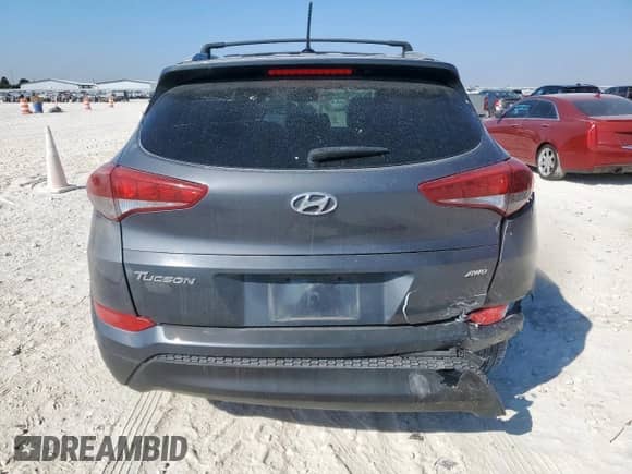 2017 Hyundai Tucson SE with VIN KM8J3CA42HU412404, listed as a Copart auction lot 81929165 with 215,143 mi miles and Salvage title. Bid and sale history available at DreamBid. Image 6.