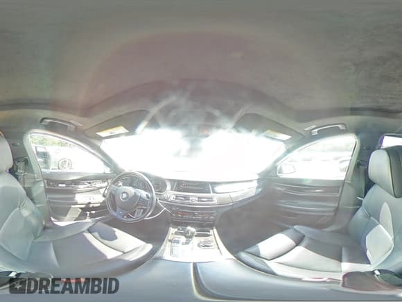 ✅ 2015 BMW 7 Series 750i xDrive • VIN: WBAYB6C51FD965925 • Lot: 64252505. Listed on Copart with 123,038 mi. Free auction sales archive from the USA and detailed vehicle history report at DreamBid. Image 15.