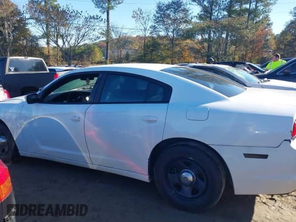 2014 Dodge Charger Police with VIN 2C3CDXAG5EH166950, listed as a IAAI auction lot 43613008 with 121,734 mi miles and . Bid and sale history available at DreamBid. Image 14.