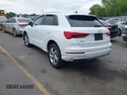✅ 2021 Audi Q3 Premium • VIN: WA1AUCF39M1068531 • Lot: 42289153. Wystawiony na IAAI z przebiegiem 96 275 mil. Bezpłatny archiwum sprzedaży aukcyjnych z USA i szczegółowy raport historii pojazdu na DreamBid. Zdjęcie 3.