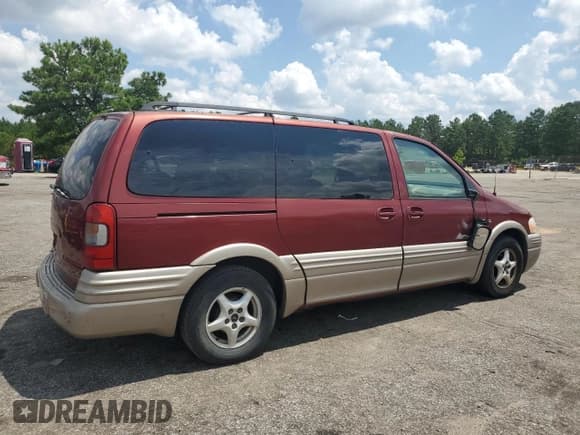 ✅ 2003 Pontiac Montana w/1SE Pkg • VIN: 1GMDX13E83D280026 • Lot: 62634865. Wystawiony na Copart z przebiegiem 245 644 mil. Bezpłatny archiwum sprzedaży aukcyjnych z USA i szczegółowy raport historii pojazdu na DreamBid. Zdjęcie 3.