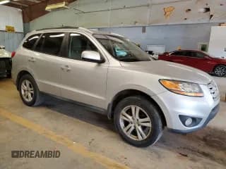 ✅ 2011 Hyundai Santa Fe SE • VIN: 5XYZH4AG1BG018247 • Lot: 57107634. Listed on Copart with 209,184 mi. Free auction sales archive from the USA and detailed vehicle history report at DreamBid. Image 4.