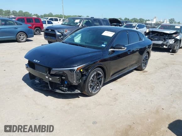 ✅ 2025 Kia K4 GT-Line • VIN: 3KPFW4DE0SE051465 • Lot: 42821498. Listed on IAAI with 1,263 mi. Free auction sales archive from the USA and detailed vehicle history report at DreamBid. Image 2.