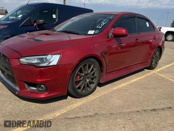 ✅ 2012 Mitsubishi Lancer Evolution GSR • VIN: JA32W8FV0CU019216 • Lot: 75898944. Listed on Copart with 129,387 mi. Free auction sales archive from the USA and detailed vehicle history report at DreamBid. Image 2.