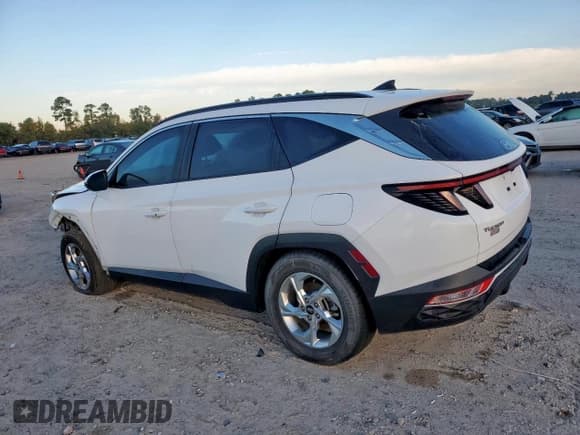 ✅ 2022 Hyundai Tucson SEL • VIN: KM8JB3AE9NU021127 • Lot: 82311135. Listed on Copart with 107,039 mi. Free auction sales archive from the USA and detailed vehicle history report at DreamBid. Image 2.