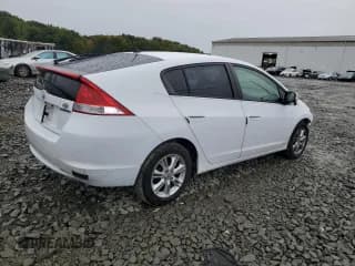 ✅ 2010 Honda Insight EX • VIN: JHMZE2H79AS035081 • Лот: 72978784. Опубликован ранее на Copart с пробегом 146 296 миль. Бесплатный доступ к архиву аукционных продаж из США и подробный отчёт об истории автомобиля на DreamBid. Изображение 3.