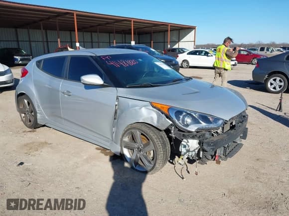 ✅ 2013 Hyundai Veloster Turbo • VIN: KMHTC6AE6DU162372 • Lot: 41481820. Wystawiony na IAAI z przebiegiem 105 650 mil. Bezpłatny archiwum sprzedaży aukcyjnych z USA i szczegółowy raport historii pojazdu na DreamBid. Zdjęcie 1.