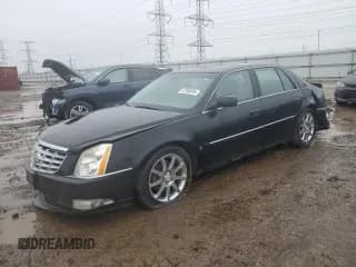 ✅ 2006 Cadillac DTS 1SE • VIN: 1G6KD57966U143716 • Lot: 47286855. Listed on Copart with 90,482 mi. Free auction sales archive from the USA and detailed vehicle history report at DreamBid. Image 1.