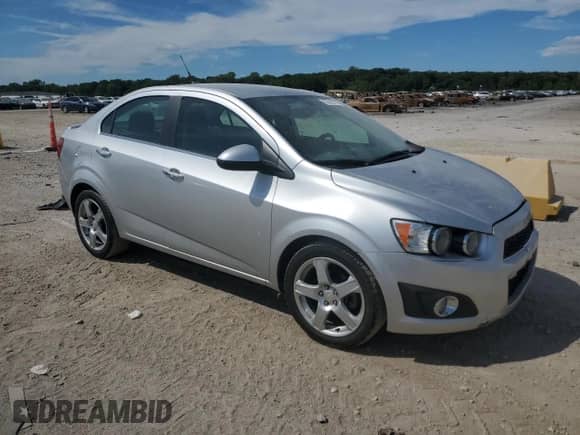 2014 Chevrolet Sonic LTZ with VIN 1G1JE5SB6E4200911, listed as a Copart auction lot 70312775 with 97,202 mi miles and Salvage title. Bid and sale history available at DreamBid. Image 4.