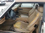 ✅ 1994 Jaguar XJS • VIN: SAJNX2749RC191243 • Lot: 76037994. Wystawiony na Copart z przebiegiem 74 842 mil. Bezpłatny archiwum sprzedaży aukcyjnych z USA i szczegółowy raport historii pojazdu na DreamBid. Zdjęcie 7.
