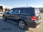 ✅ 2012 Mercedes-Benz GL 450 • VIN: 4JGBF7BE7CA771669 • Lot: 82631825. Wystawiony na Copart z przebiegiem 143 906 mil. Bezpłatny archiwum sprzedaży aukcyjnych z USA i szczegółowy raport historii pojazdu na DreamBid. Zdjęcie 2.