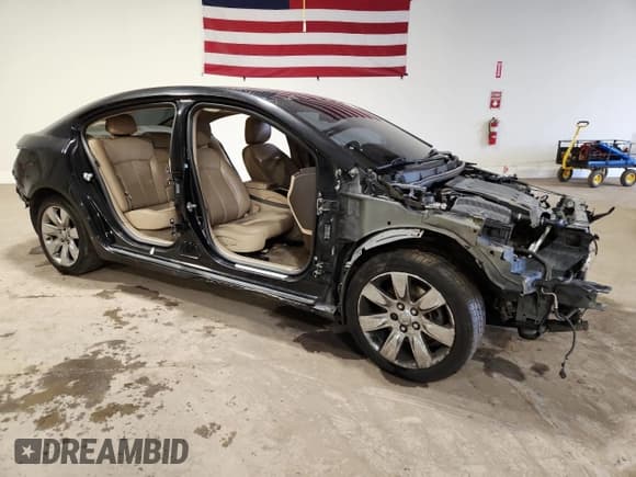 ✅ 2013 Buick LaCrosse Leather • VIN: 1G4GC5E36DF217508 • Lot: 90999035. Listed on Copart with 161,848 mi. Free auction sales archive from the USA and detailed vehicle history report at DreamBid. Image 4.