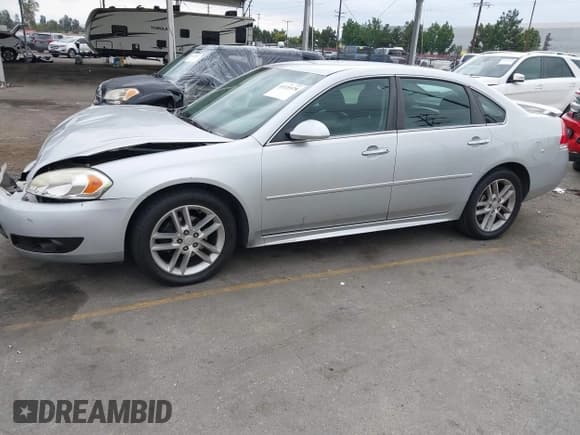 ✅ 2016 Chevrolet Impala LTZ • VIN: 2G1WC5E34G1132915 • Lot: 43325578. Listed on IAAI with 144,317 mi. Free auction sales archive from the USA and detailed vehicle history report at DreamBid. Image 13.