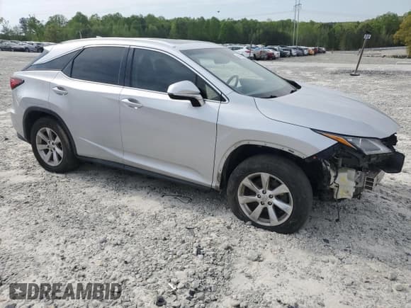 ✅ 2016 Lexus RX 350 • VIN: 2T2BZMCA4GC020161 • Lot: 52846525. Listed on Copart with 154,391 mi. Free auction sales archive from the USA and detailed vehicle history report at DreamBid. Image 4.