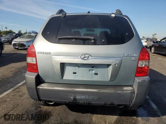 2005 Hyundai Tucson GLS z VIN KM8JN12D95U093916, wystawiony jako Copart lot #76326214 z przebiegiem 159 295 mil mil oraz Szkoda całkowita • Salvage title. Historia ofert i sprzedaży dostępna na DreamBid. Obrazek 6.