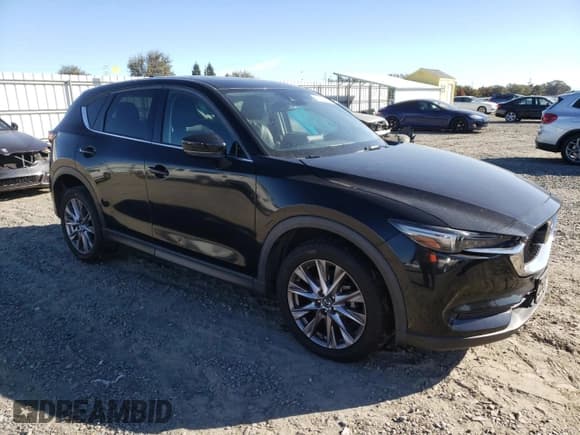 ✅ 2019 Mazda CX-5 Grand Touring • VIN: JM3KFBDM6K0550989 • Lot: 82416825. Wystawiony na Copart z przebiegiem 123 806 mil. Bezpłatny archiwum sprzedaży aukcyjnych z USA i szczegółowy raport historii pojazdu na DreamBid. Zdjęcie 4.