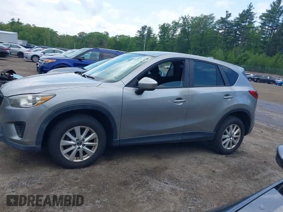✅ 2014 Mazda CX-5 Sport • VIN: JM3KE2BEXE0322870 • Lot: 42352920. Listed on IAAI with 368,209 mi. Free auction sales archive from the USA and detailed vehicle history report at DreamBid. Image 15.
