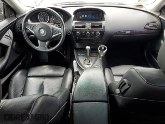 ✅ 2007 BMW 6 Series 650i • VIN: WBAEH13517CR52037 • Лот: 80124315. Опубликован ранее на Copart с пробегом 104 702 миль. Бесплатный доступ к архиву аукционных продаж из США и подробный отчёт об истории автомобиля на DreamBid. Изображение 8.