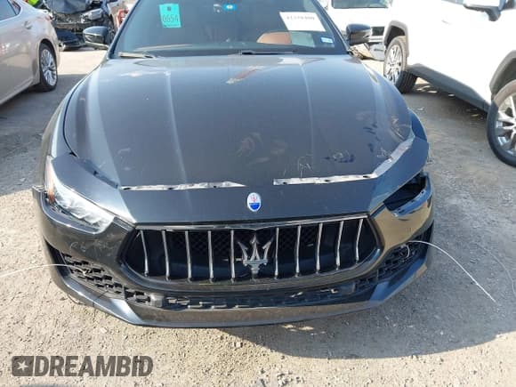 ✅ 2018 Maserati Ghibli • VIN: ZAM57XSA4J1295210 • Lot: 42378480. Listed on IAAI with 43,408 mi. Free auction sales archive from the USA and detailed vehicle history report at DreamBid. Image 12.