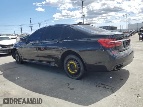 ✅ 2018 BMW 7 Series 750i • VIN: WBA7F0C5XJGM23016 • Лот: 51284255. Опубликован ранее на Copart с пробегом 69 460 миль. Бесплатный доступ к архиву аукционных продаж из США и подробный отчёт об истории автомобиля на DreamBid. Изображение 2.