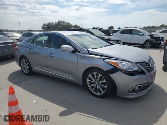 ✅ 2015 Hyundai Azera • VIN: KMHFG4JG4FA453156 • Lot: 86844795. Listed on Copart with 104,948 mi. Free auction sales archive from the USA and detailed vehicle history report at DreamBid. Image 4.