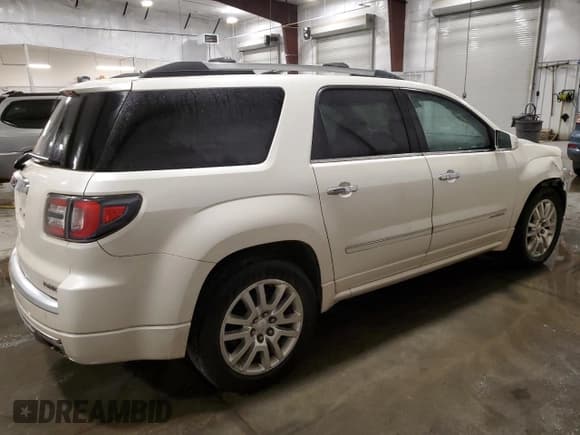 ✅ 2015 GMC Acadia Denali • VIN: 1GKKVTKD4FJ320747 • Lot: 82299865. Listed on Copart with 127,690 mi. Free auction sales archive from the USA and detailed vehicle history report at DreamBid. Image 3.
