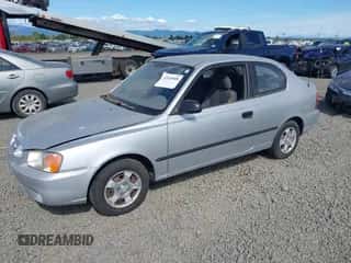 2002 Hyundai Accent z VIN KMHCF35G82U173856, wystawiony jako IAAI lot #42620048 z przebiegiem 128 986 mil mil oraz . Historia ofert i sprzedaży dostępna na DreamBid. Obrazek 2.