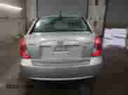 2007 Hyundai Accent GLS z VIN KMHCN46CX7U157508, wystawiony jako Copart lot #78137694 z przebiegiem 174 140 mil mil oraz Szkoda całkowita • Salvage title. Historia ofert i sprzedaży dostępna na DreamBid. Obrazek 6.