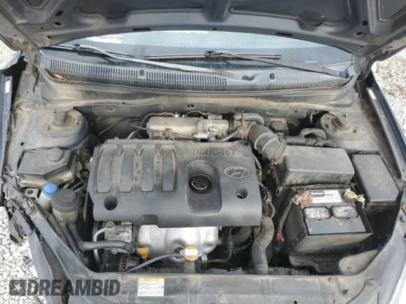 2009 Hyundai Accent Auto GLS z VIN KMHCN46C99U367181, wystawiony jako Copart lot #67382084 z przebiegiem 200 446 mil mil oraz Szkoda całkowita • Salvage title. Historia ofert i sprzedaży dostępna na DreamBid. Obrazek 11.