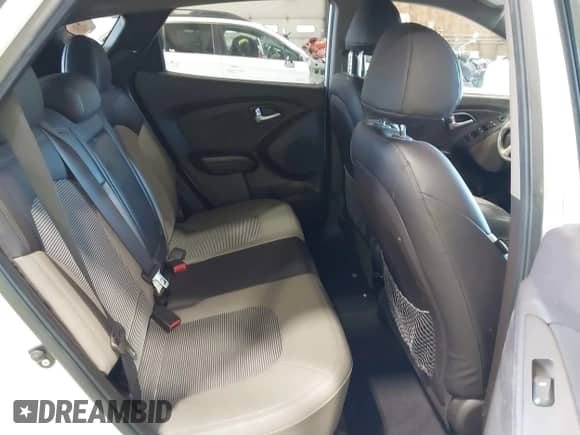 2013 Hyundai Tucson Limited with VIN KM8JUCAC7DU693839, listed as a IAAI auction lot 43026808 with 205,556 mi miles and . Bid and sale history available at DreamBid. Image 8.