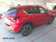 ✅ 2023 Mazda CX-5 S Premium Plus • VIN: JM3KFBEM4P0227787 • Lot: 42567439. Wystawiony na IAAI z przebiegiem 21 779 mil. Bezpłatny archiwum sprzedaży aukcyjnych z USA i szczegółowy raport historii pojazdu na DreamBid. Zdjęcie 4.