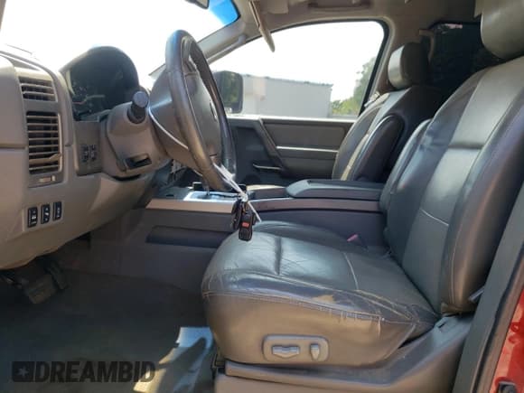 ✅ 2006 Nissan Titan XE • VIN: 1N6BA07A46N567566 • Lot: 62355015. Listed on Copart with 176,903 mi. Free auction sales archive from the USA and detailed vehicle history report at DreamBid. Image 7.