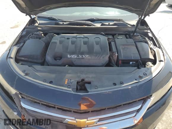 2014 Chevrolet Impala LT z VIN 2G1125S3XE9162937, wystawiony jako Copart lot #84061545 z przebiegiem 267 967 mil mil oraz Szkoda całkowita • Salvage title. Historia ofert i sprzedaży dostępna na DreamBid. Obrazek 11.