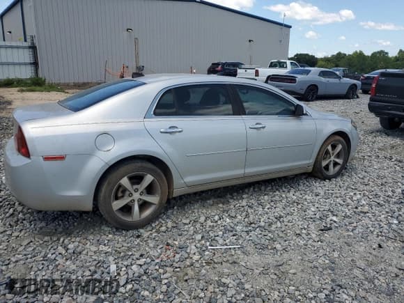 ✅ 2012 Chevrolet Malibu 1LT • VIN: 1G1ZC5E07CF323492 • Lot: 65947164. Listed on Copart with 198,934 mi. Free auction sales archive from the USA and detailed vehicle history report at DreamBid. Image 3.