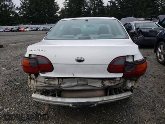 2002 Chevrolet Malibu z VIN 1G1ND52J22M714701, wystawiony jako Copart lot #87484674 z przebiegiem 277 484 mil mil oraz Szkoda całkowita • Salvage title. Historia ofert i sprzedaży dostępna na DreamBid. Obrazek 6.