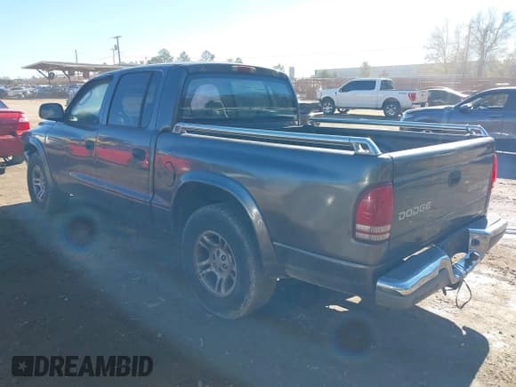 ✅ 2003 Dodge Dakota SLT • VIN: 1D7HL48X03S174569 • Lot: 41159169. Wystawiony na IAAI z przebiegiem 156 551 mil. Bezpłatny archiwum sprzedaży aukcyjnych z USA i szczegółowy raport historii pojazdu na DreamBid. Zdjęcie 3.