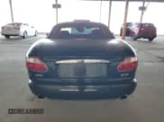 ✅ 2005 Jaguar XK XK8 • VIN: SAJDA42C852A41568 • Lot: 62331245. Listed on Copart with 145,057 mi. Free auction sales archive from the USA and detailed vehicle history report at DreamBid. Image 6.