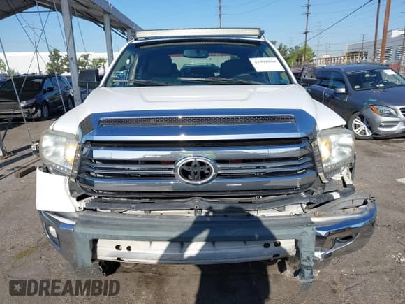 ✅ 2014 Toyota Tundra SR5 • VIN: 5TFDM5F13EX053244 • Lot: 41998804. Listed on IAAI with 288,414 mi. Free auction sales archive from the USA and detailed vehicle history report at DreamBid. Image 6.